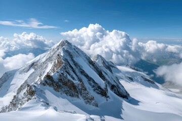 Majestic Alpine Peak: Snow-Clad Majesty and Serene Cloudscape
