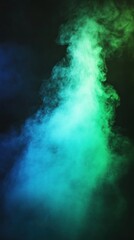 Fototapeta premium Abstract teal and green smoke plume against black background