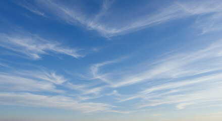 Fototapeta premium Cirrus Dreams: Azure Skies and Feathered Clouds - A Breathtaking View, Skywatching, Atmosphere, Weather Patterns