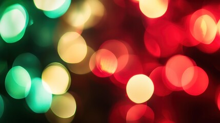 Fototapeta premium Festive red, green, gold bokeh lights. Holiday background