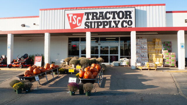 Tractor Supply Co. with pumpkins and mums in autumn