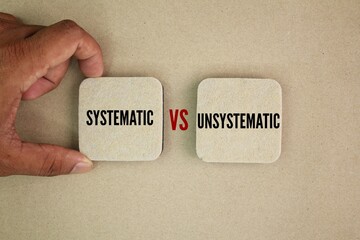 two squares with the words systematic vs unsystematic. which is why it's also referred to as market...