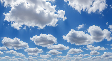 Fototapeta premium Cumulus Clouds Delight: A Vast Blue Sky Canvas Painted with Fluffy White Wonders!