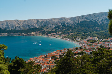 Fototapeta premium Town of Baska, Krk Island, Croatia Stock Photo. View of Vela Beach Baska, Adriatic sea coastline.