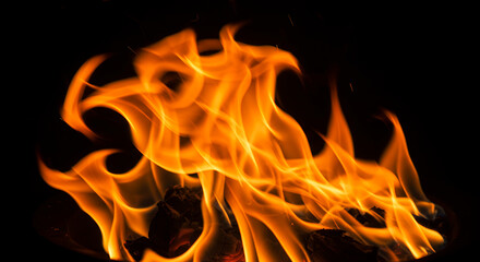 Fototapeta premium Fiery Dance: Captivating Flames Against Black Backdrop - Ignite Your Senses!