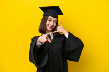 Young university graduate Ukrainian woman isolated on yellow background making phone gesture and...