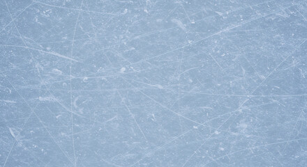 Scratched Ice Rink Texture: Frozen Blue Arena Surface with Skate Marks - Perfect for Winter Sports Backgrounds and Textures!