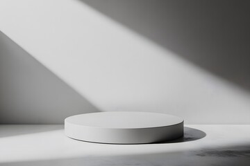 Minimalist white product display podium with natural light and shadows for presentation