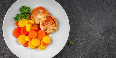 Vegetarian cutlet, boiled carrotbowl natural food vegetable dish organic fresh gourmet food background on the table rustic food top view copy space keto and paleo diet vegetarian and vegan food