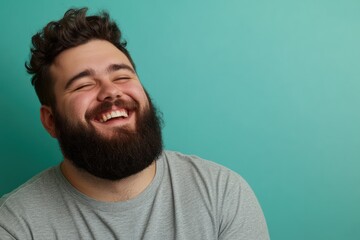 Obraz premium Happy plus size man with beard smiling confidently