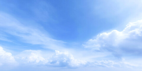 Fototapeta premium serene cloudscape featuring large, billowy white clouds against bright blue sky creates peaceful atmosphere, inviting contemplation and tranquility