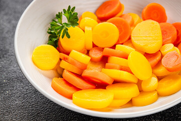 Carrot rings boiled vegetable vegetable dish fresh delicious gourmet food background on the table rustic food top view copy space keto and paleo diet vegetarian and vegan food