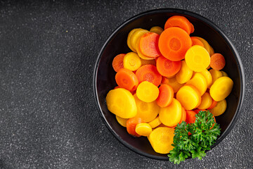 Carrot rings boiled vegetable vegetable dish fresh delicious gourmet food background on the table rustic food top view copy space keto and paleo diet vegetarian and vegan food