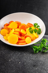 Carrot rings boiled vegetable vegetable dish fresh delicious gourmet food background on the table rustic food top view copy space keto and paleo diet vegetarian and vegan food