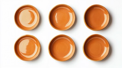 Six terracotta-colored dishes arranged in a grid