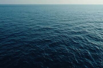 Obraz premium Vibrant Turquoise Sea Texture Calm Ocean Surface and Gentle Ripple Water in Tranquil Blue Tones Natural Maritime Background with Serene Environment and Scenic Horizon