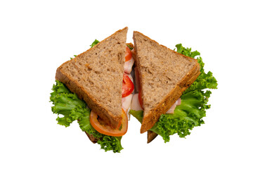 Two ham sandwiches with lettuce, tomato, and ham on whole-wheat bread are isolated on a white background.