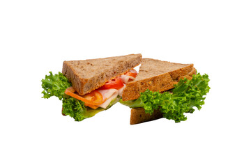 Two ham sandwiches with lettuce, tomato, and ham on whole-wheat bread are isolated on a white background.