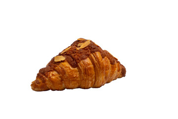 A flaky almond croissant, generously topped with sliced almonds, rests on a white background, showcasing its rich, golden-brown crust.