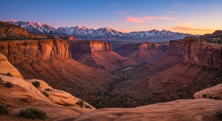 Stunning canyon vista at dawn.  Sunrise over a red rock landscape