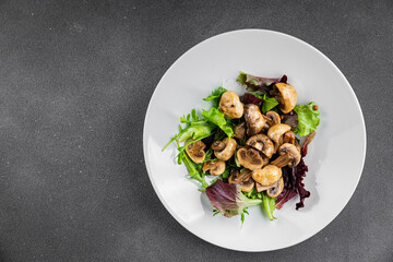 Mushrooms pickled champignon salad snack fresh delicious gourmet food background on the table rustic food top view copy space keto and paleo diet vegetarian and vegan food