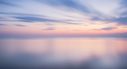 Serene Sunset: Pastel Skies & Reflections Over Tranquil Water - A Beautiful Long Exposure Seascape