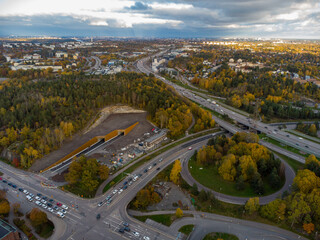 Autumn Interchange: Urban Arteries Amidst Golden Forests