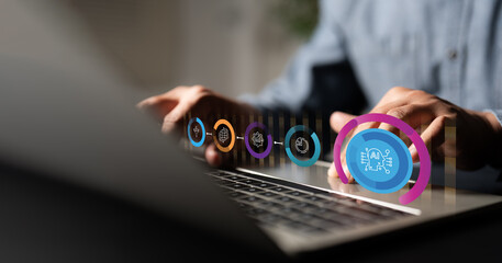A hand businessman analyst data management system on laptop. Corporate strategy for finance,...