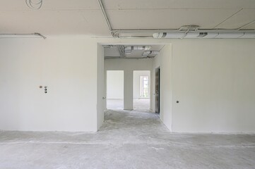 rough repairs for self-finishing. interior decoration, bare walls of the room, stage of...
