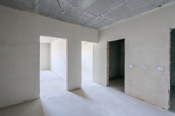 rough repairs for self-finishing. interior decoration, bare walls of the room, stage of construction. interior apartment room.
