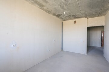 rough repairs for self-finishing. interior decoration, bare walls of the room, stage of construction. interior apartment room.