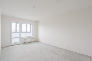 rough repairs for self-finishing. interior decoration, bare walls of the room, stage of...