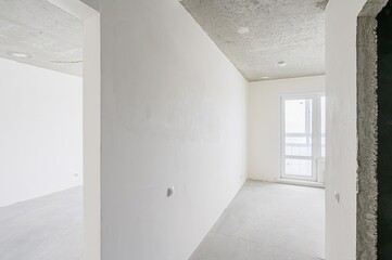 rough repairs for self-finishing. interior decoration, bare walls of the room, stage of construction. interior apartment room.