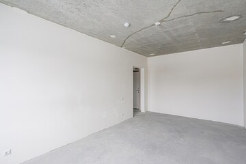 rough repairs for self-finishing. interior decoration, bare walls of the room, stage of...