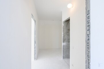 rough repairs for self-finishing. interior decoration, bare walls of the room, stage of construction. interior apartment room.