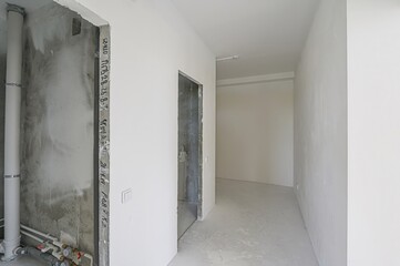 rough repairs for self-finishing. interior decoration, bare walls of the room, stage of...