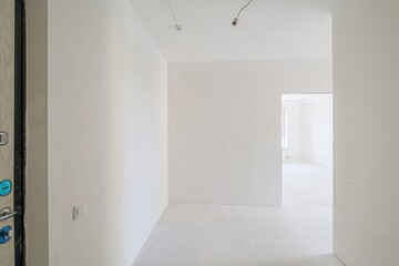 rough repairs for self-finishing. interior decoration, bare walls of the room, stage of construction. interior apartment room.