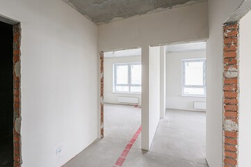 rough repairs for self-finishing. interior decoration, bare walls of the room, stage of construction. interior apartment room.