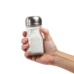 A hand holding a salt shaker filled with white salt.