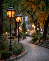 Park pathway with elegant streetlights casting warm glow at dusk, trees lining path