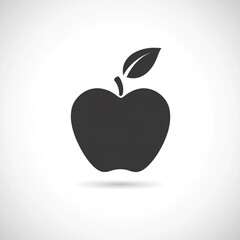 Fototapeta premium Black silhouette of an apple icon on a white background, simple shapes, flat design, vector illustration, high contrast