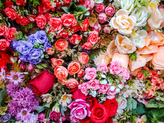 Flowers wall background with amazing pink, purple, red, orange, green and white chrysanthemum flowers ,Wedding decoration, hand made Beautiful flower wall background