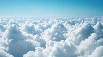 Fototapeta premium A breathtaking aerial view reveals a boundless expanse of fluffy cumulus clouds beneath a vibrant, clear blue sky, creating a serene and peaceful atmosphere. : Generative AI