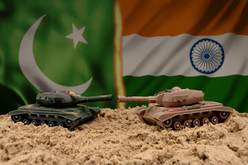 Conflict between India and Pakistan, symbolised by tanks against a background of national flags.