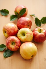 A vibrant still life of freshly picked apples, arranged artfully in a woven basket or a shallow, ornate bowl, set against a soft, creamy background