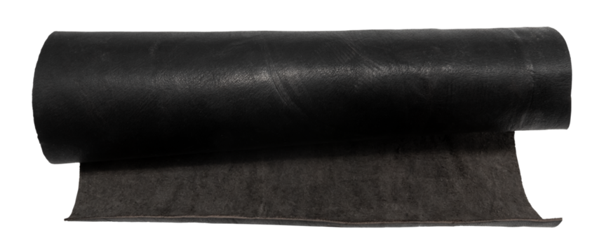 A rolled piece of black genuine leather on a white background. Piece of leather