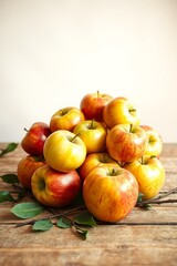 A vibrant still life of freshly picked apples, arranged artfully in a woven basket or a shallow, ornate bowl, set against a soft, creamy background