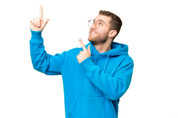 Young handsome blonde man over isolated chroma key background pointing with the index finger a great idea