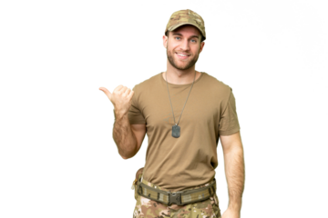 Military with dog tag over isolated chroma key background pointing to the side to present a product