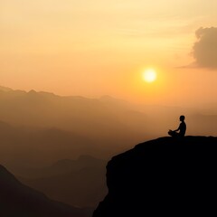Naklejka premium A person meditating on a mountaintop